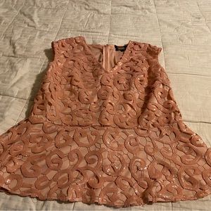 Pink dressy sleeveless blouse